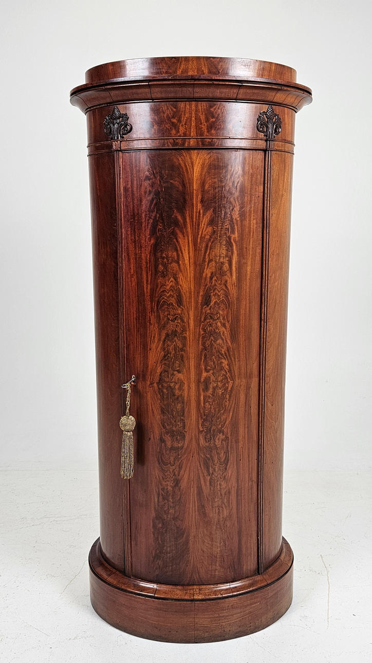 A 18th/20th century column cabinet.