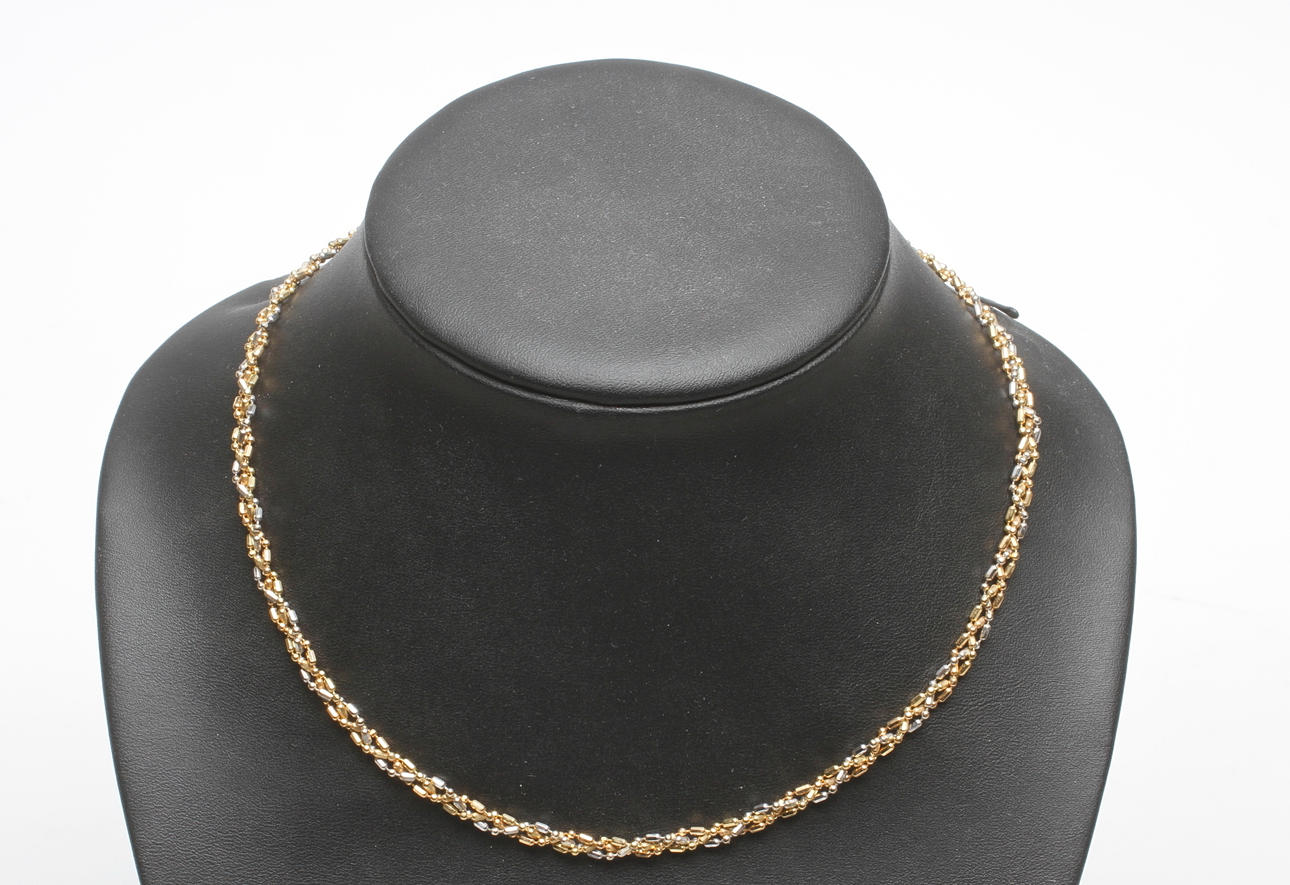 HALSBAND TVINNAD 18k rött/vitt guld ca 13.3gr.
