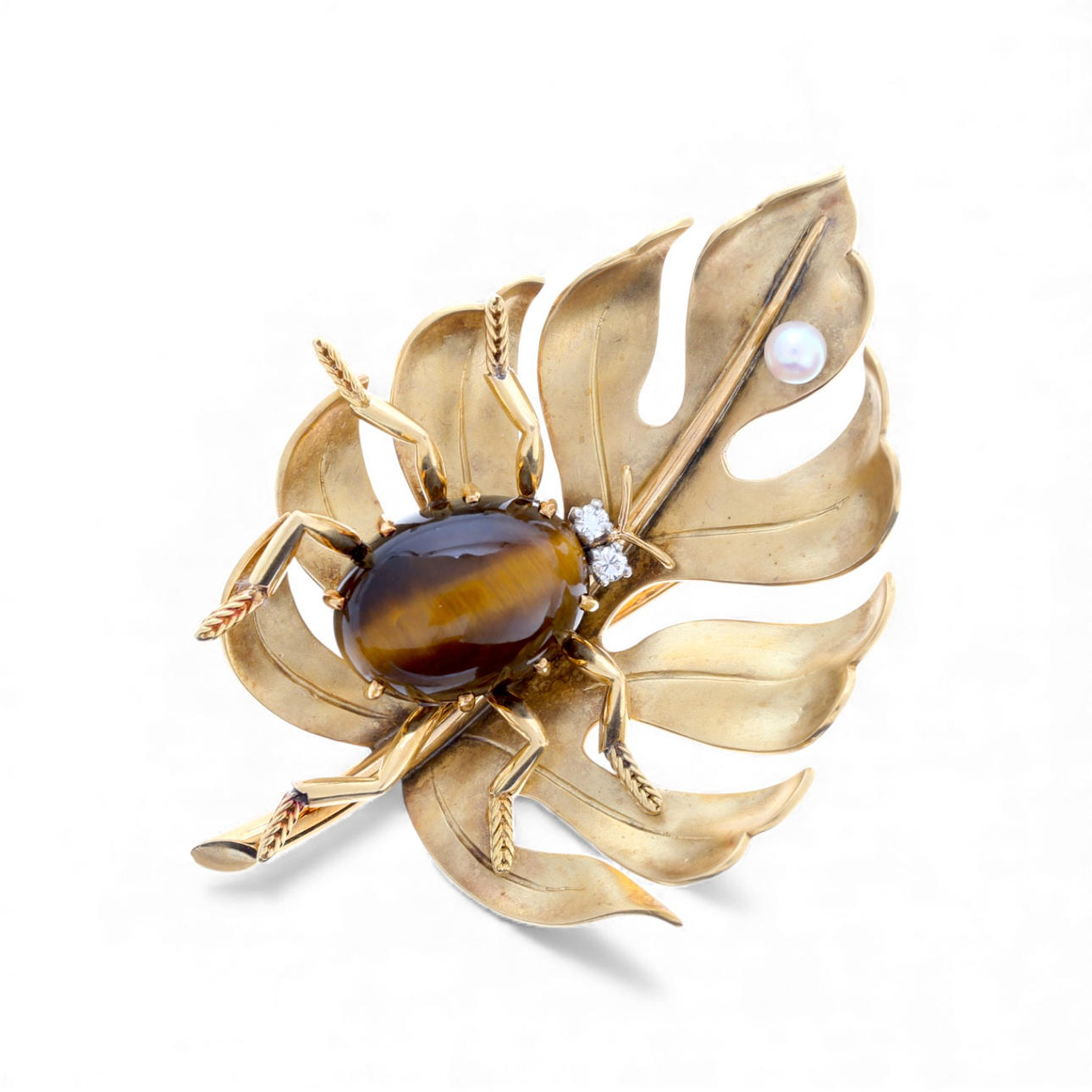 Fransk brosch i guld och strass i form av ett blad med insekt. Smycken ...