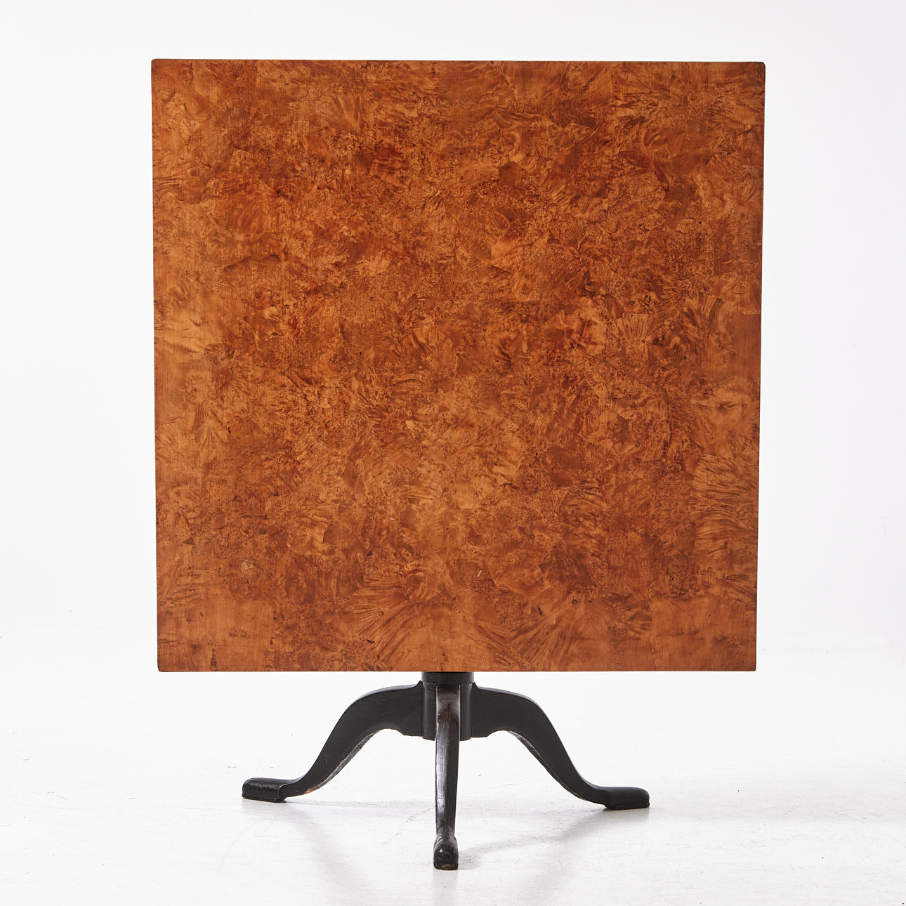 A folding table, veneered in alrot, first half of the 19th century, on ...