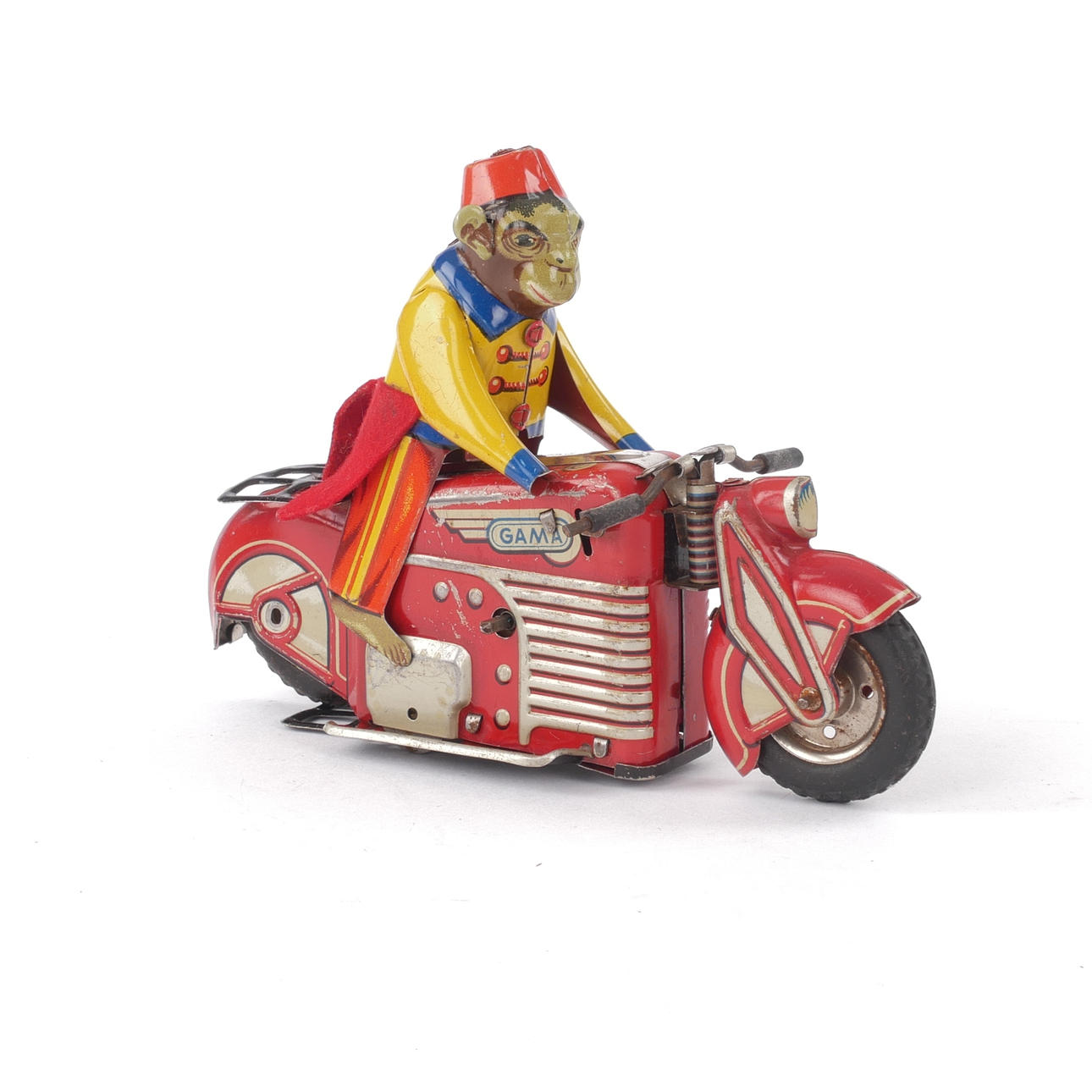 GAMMA. Motorcycle with monkey, lithographed plate, clockwork, US Zone Germany, defect.