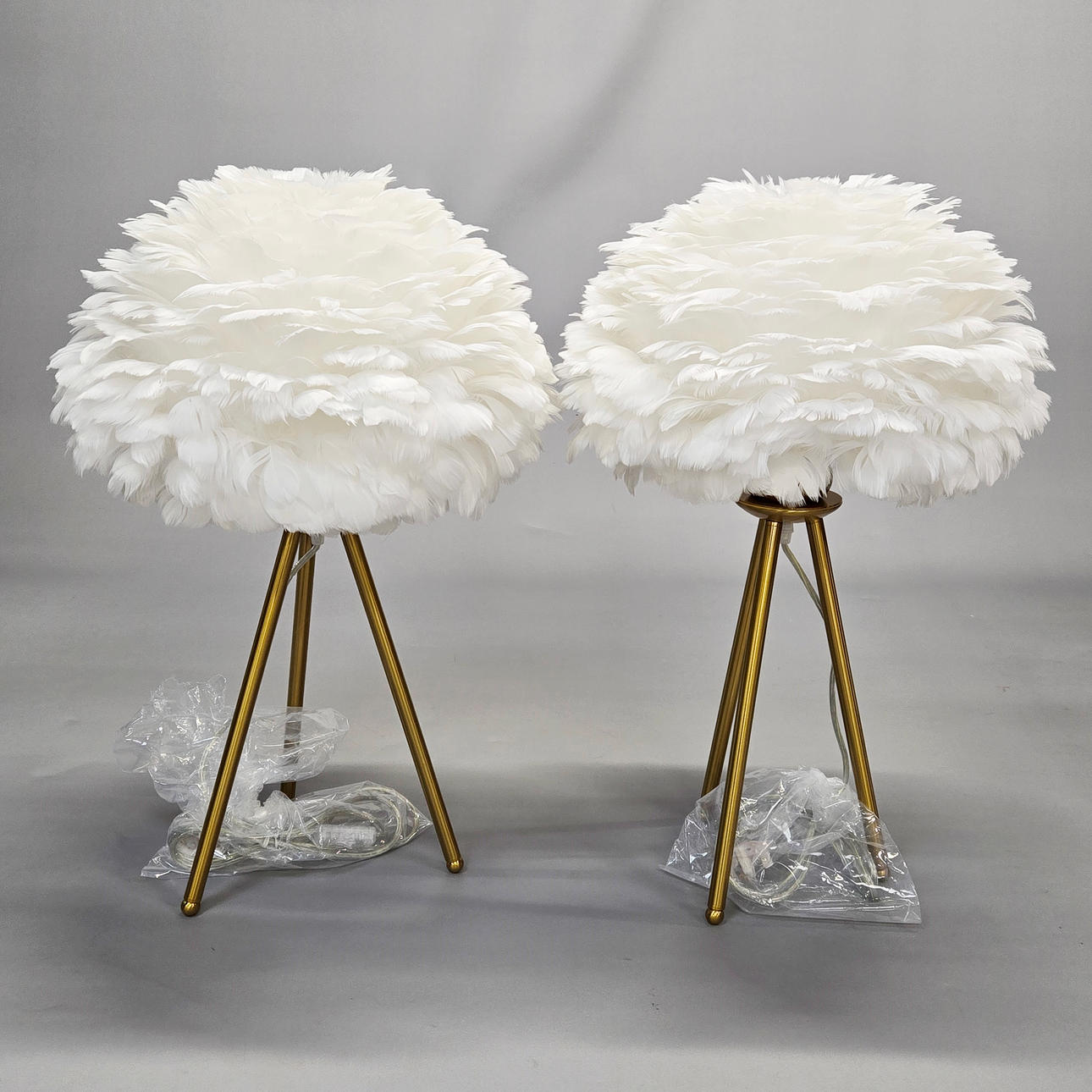TWO FEATHER SHADES & TRIPOD LAMP BASES.