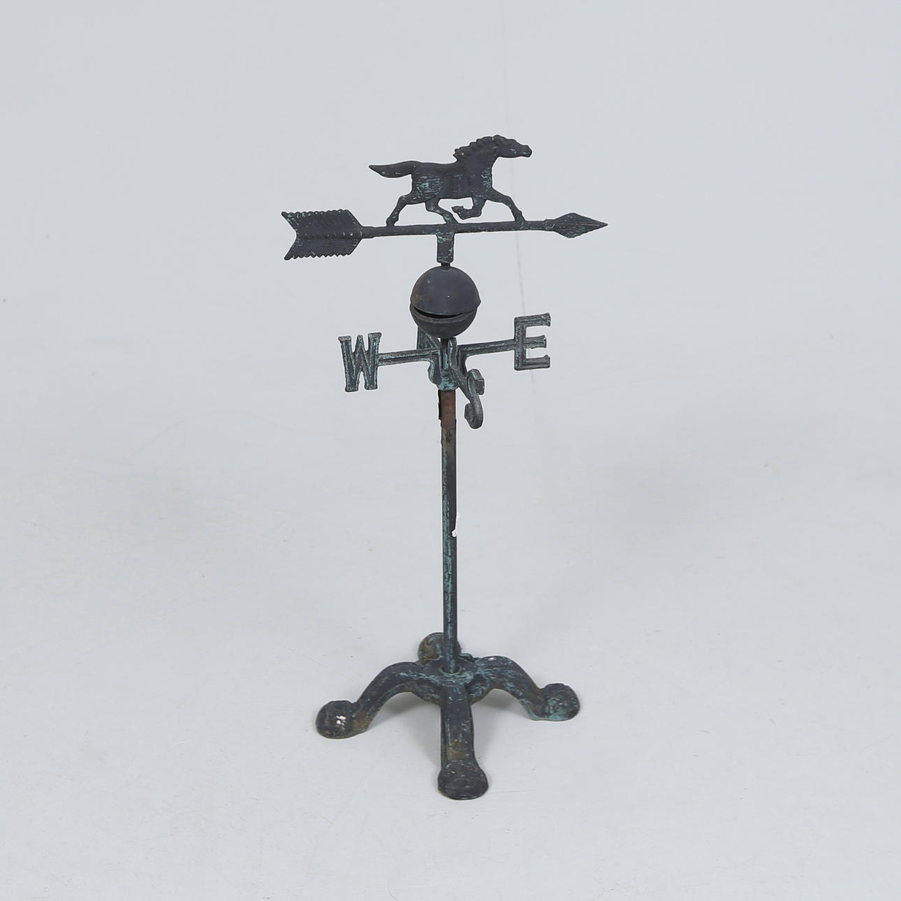 A metal wind vane, contemporary.