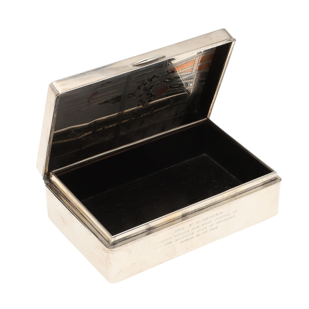 A SILVER TRINKET BOX.