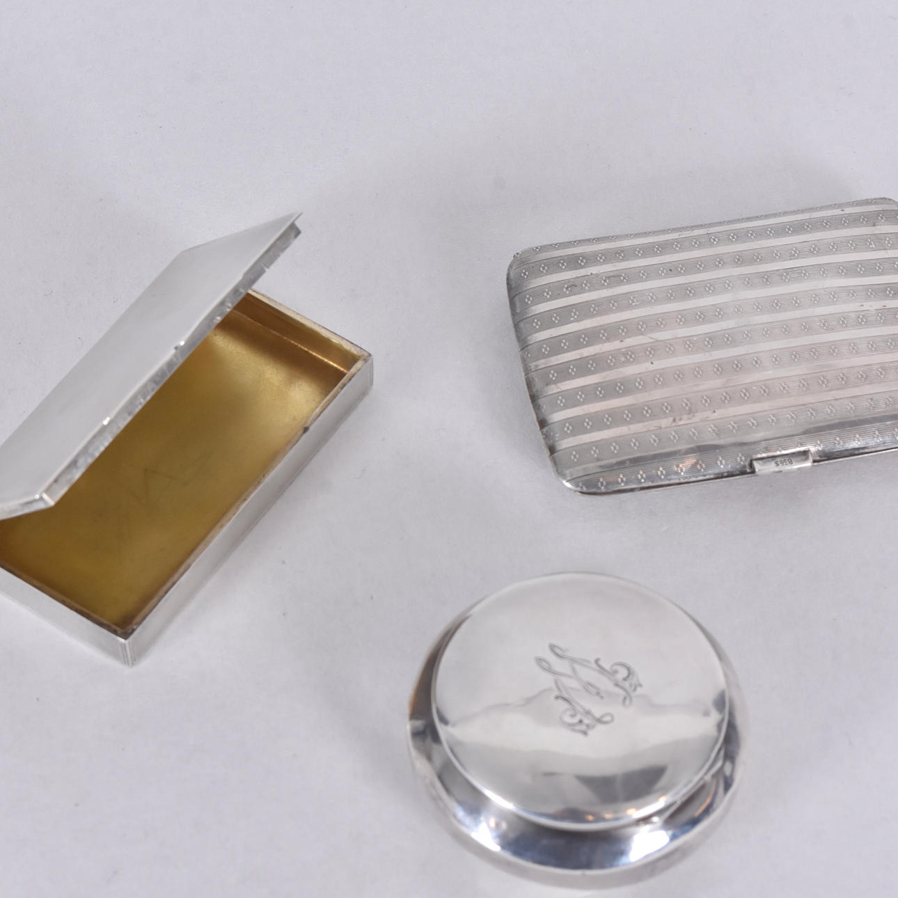 CIGARETTE CASES; 2 pcs and nipple box, silver.