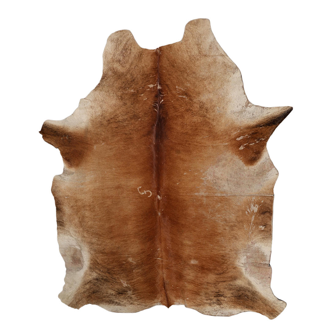 A SOUTH AMERICAN NATURAL TAN COWHIDE RUG. Carpets & Textiles - Carpets ...