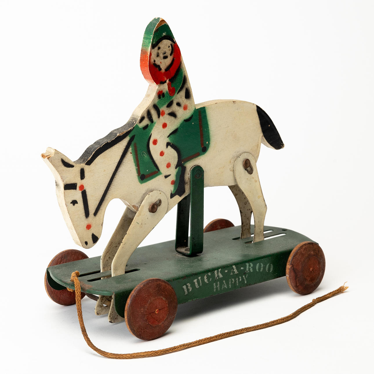 SPIELZEUG, Clown auf Esel, Holz und Blech, Firma „Buck-A-Roo Happy“ von ...