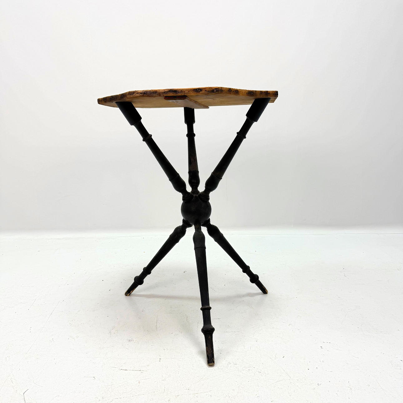 An eight-pointed Neo-Renaissance table, circa 1900.