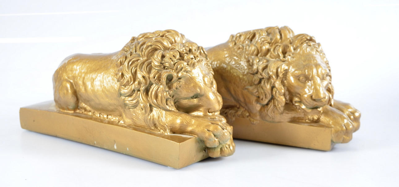 BOKSTÖD, 1-par, i form av lejon.