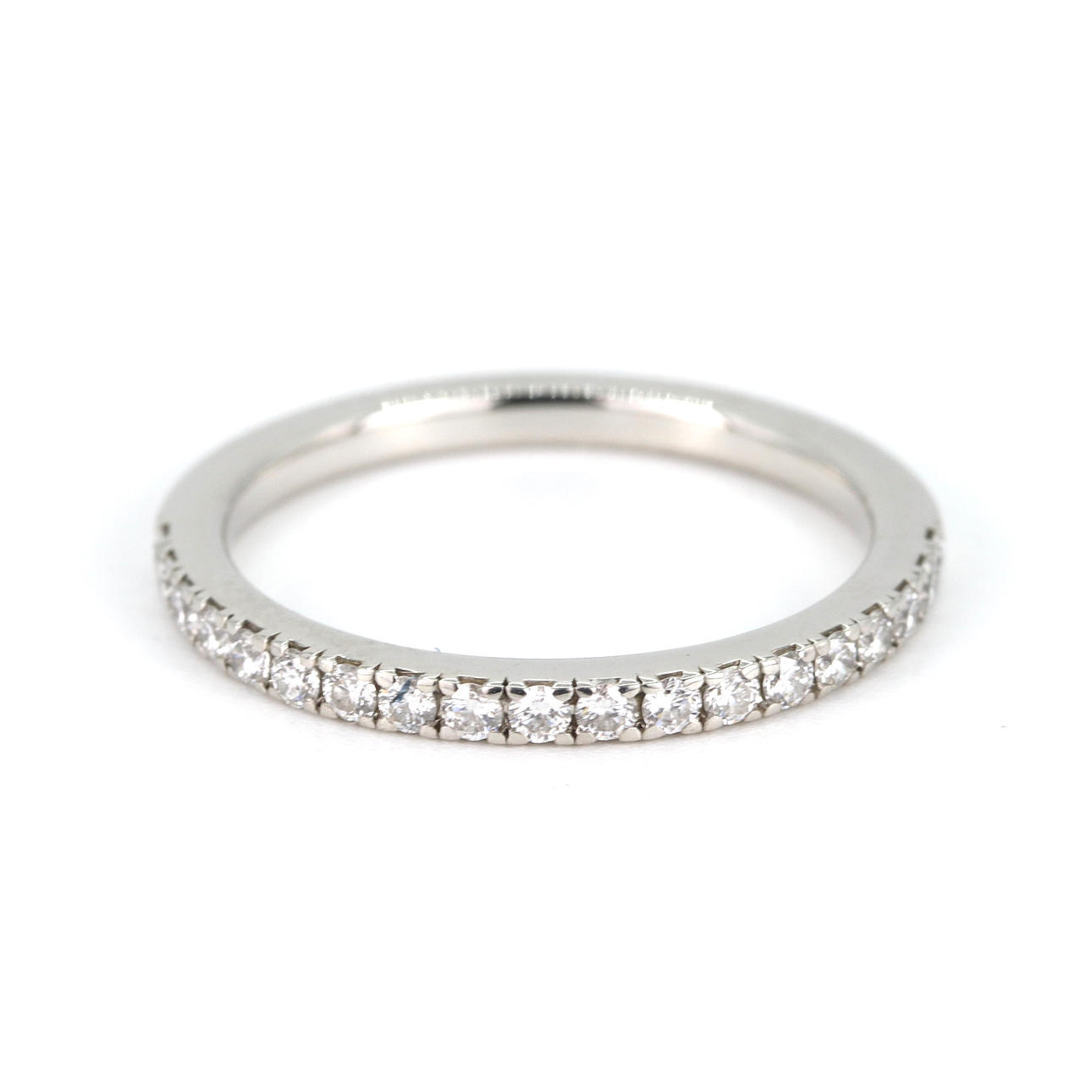 DE BEERS PLATINUM DIAMOND HALF ETTERNITY RING.