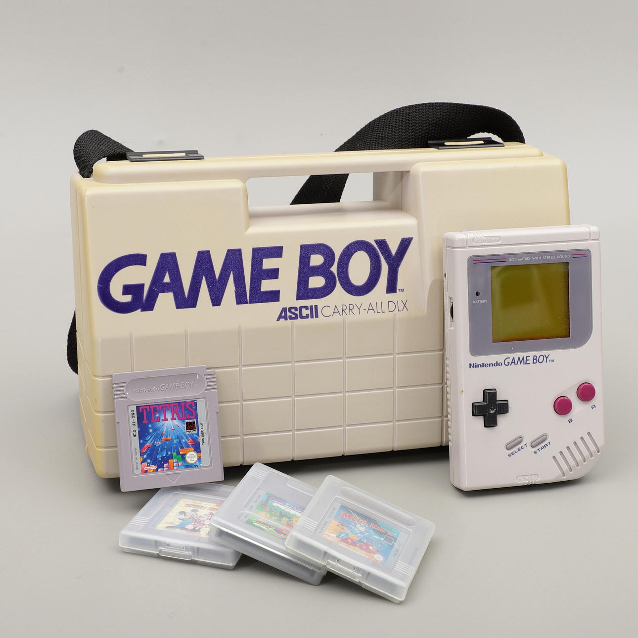 NINTENDO GAMEBOY, console with games in box, 1989.