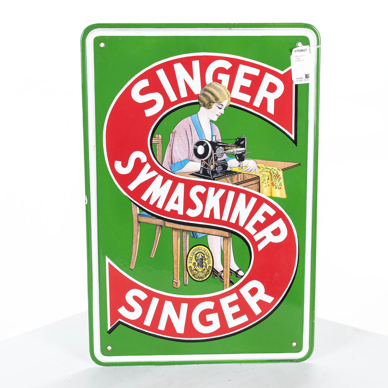 An enamel sign, “Singer Sewing Machines”, A/S Glud & Marstrands ...