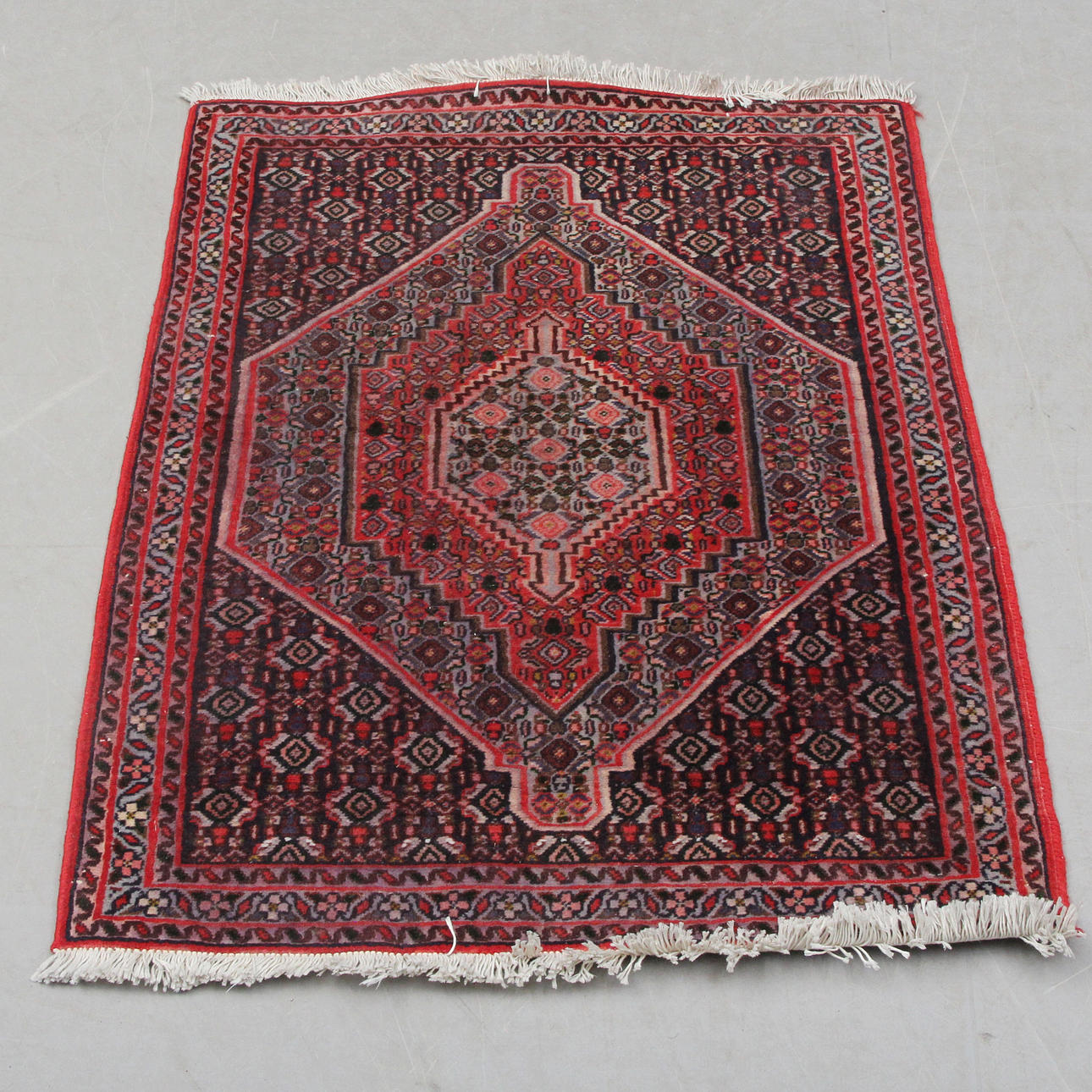 A CARPET, Oriental, red. 74x110.