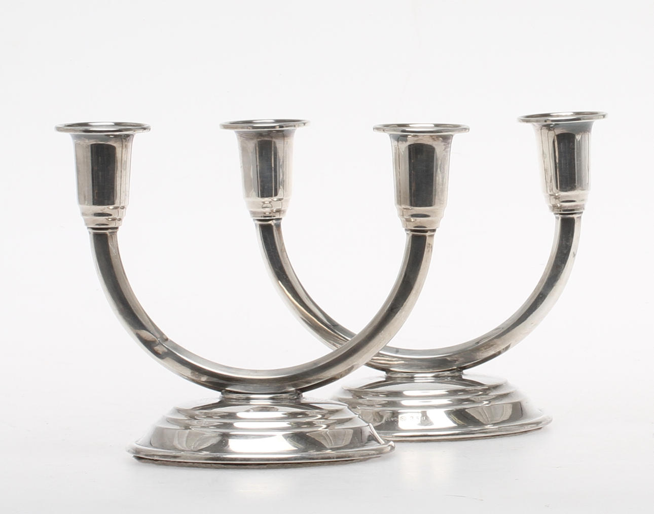 LJUSSTAKAR, ett par, för två ljus vardera, silver.