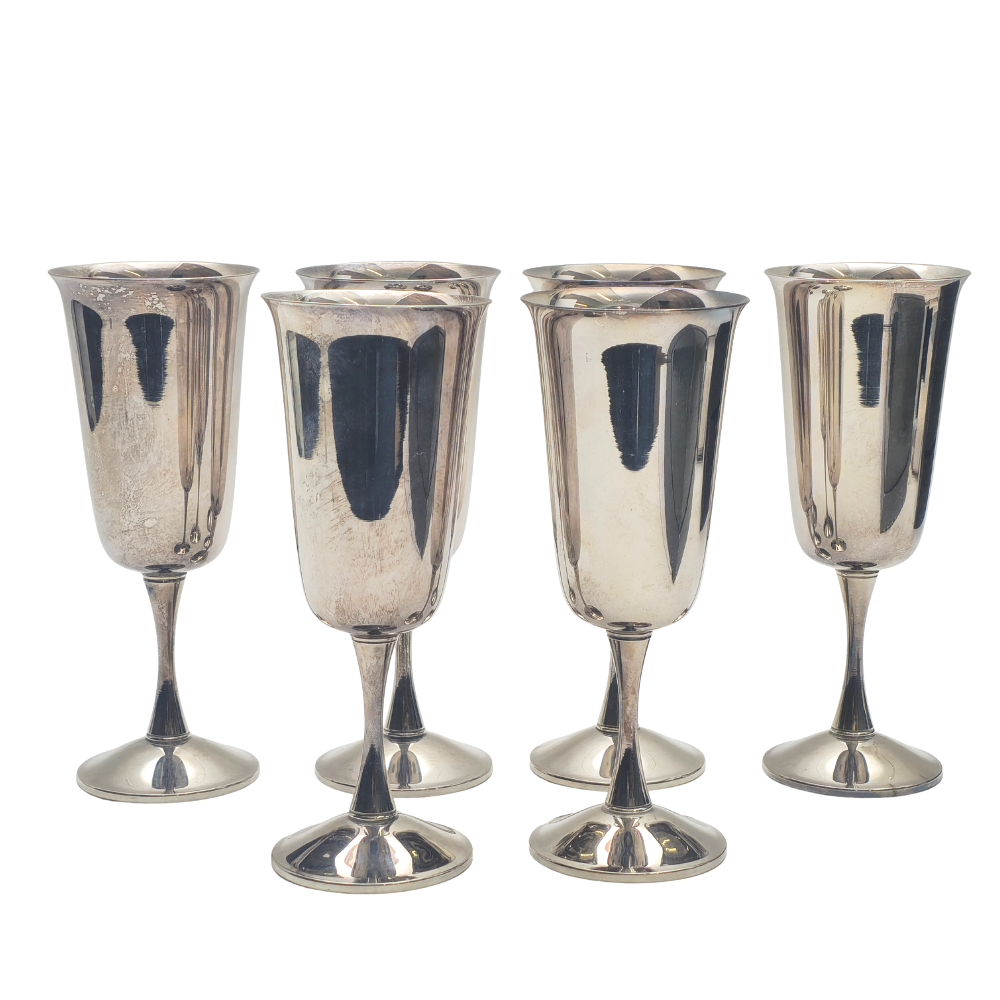 6 VALERO SILVER METAL CUPS.