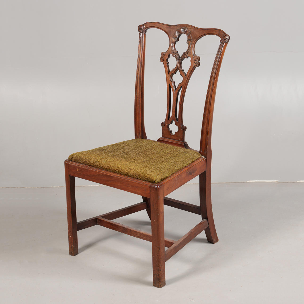 A GEORGE III CHAIR.
