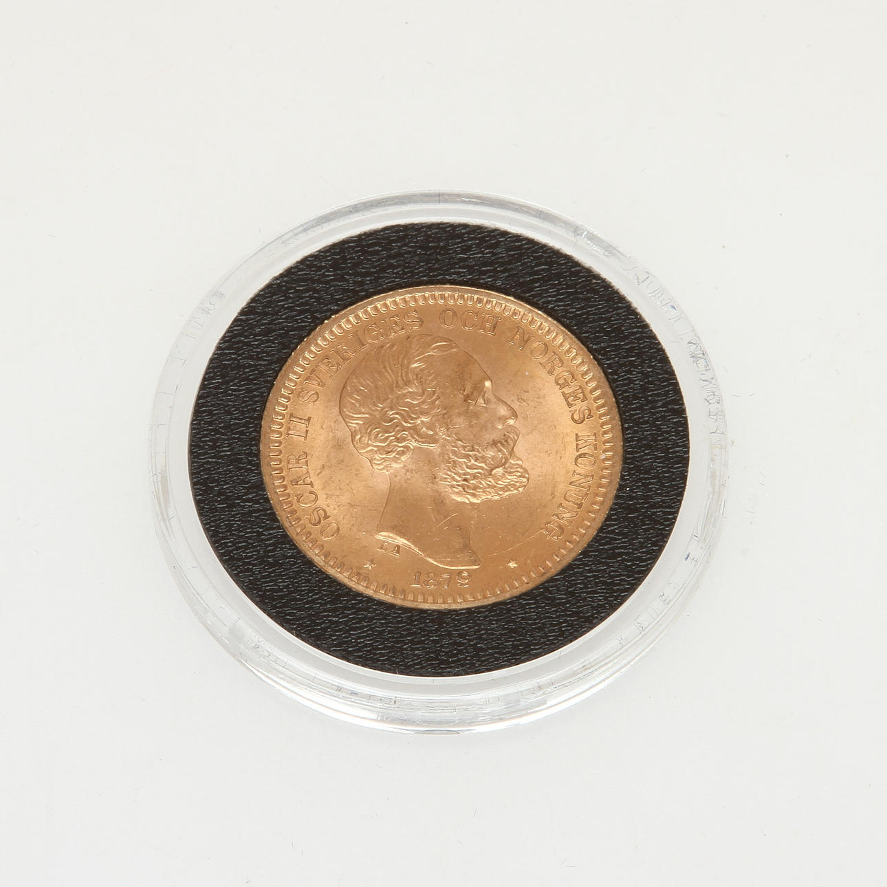 MYNT, guld, 20 Kronor, Oscar II, 1879. Vikt 8,96 g.