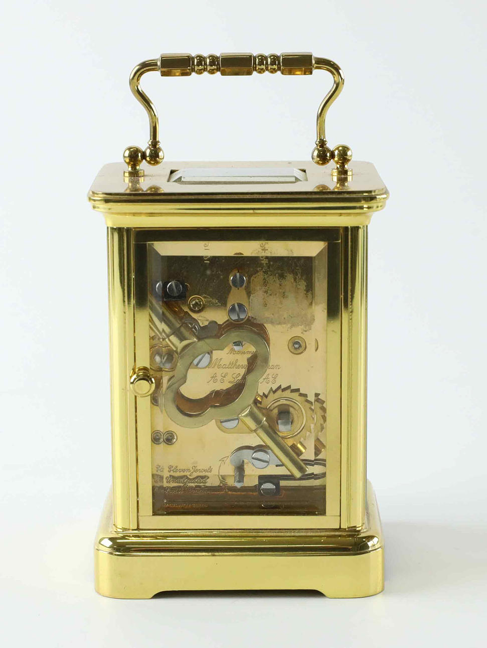 Matthew Norman, a brass travel alarm clock/alarm clock, England