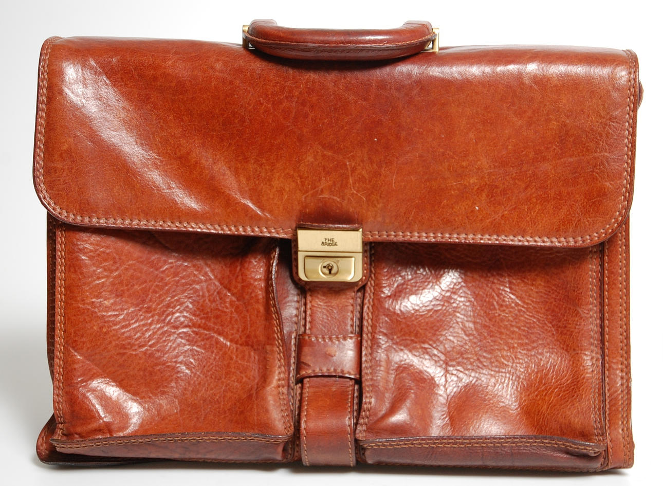 PORTFÖLJ, större, skinn " The Bridge " med tillhörande plånbok.