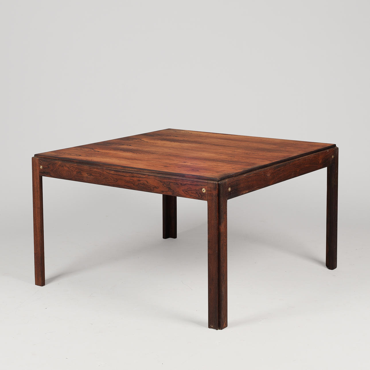 ILLUM WIKKELSØ (1919-1999). A square rosewood coffee table