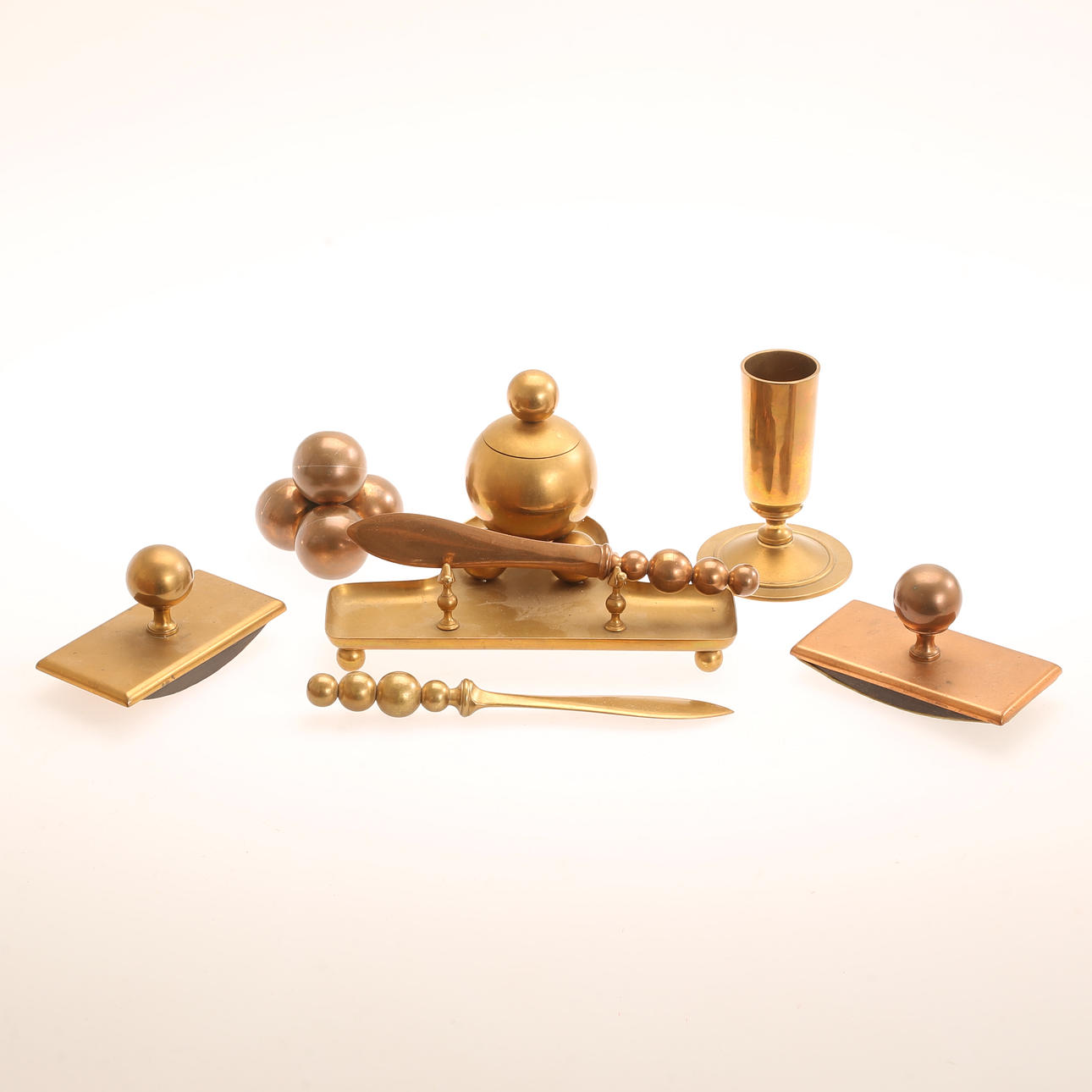 A 7-piece brass desk set, 20th century.