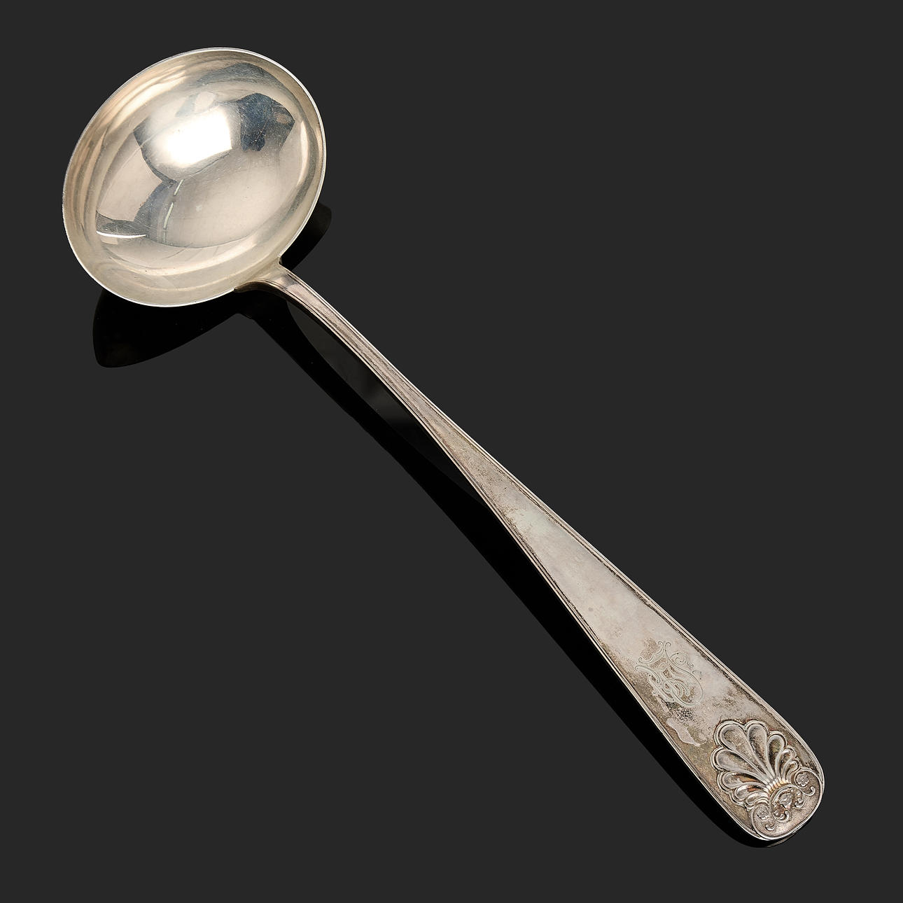 A silver soup spoon, stamped C. Hansen 1849.