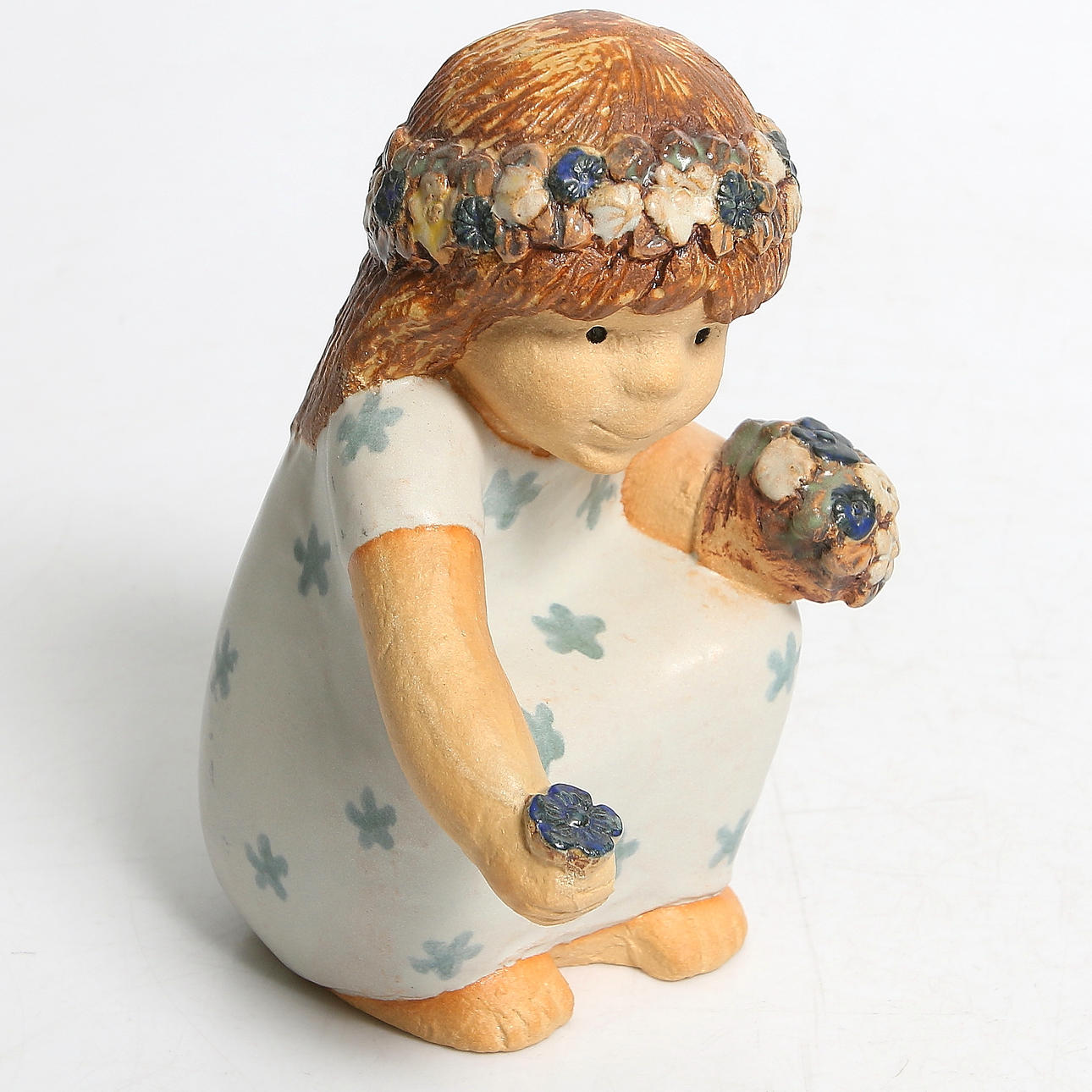 LISA LARSON. Figurin, stengods, signerad "Lisa L. Ateljé", 1900-tal.