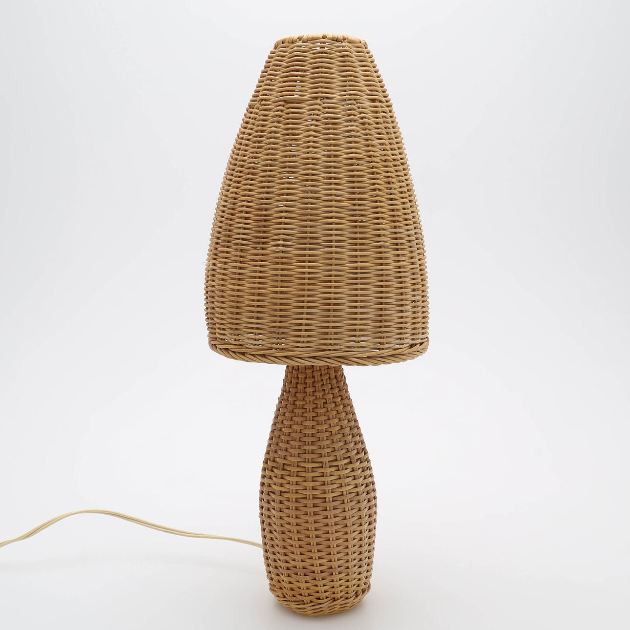 A rattan table lamp, 20th century.