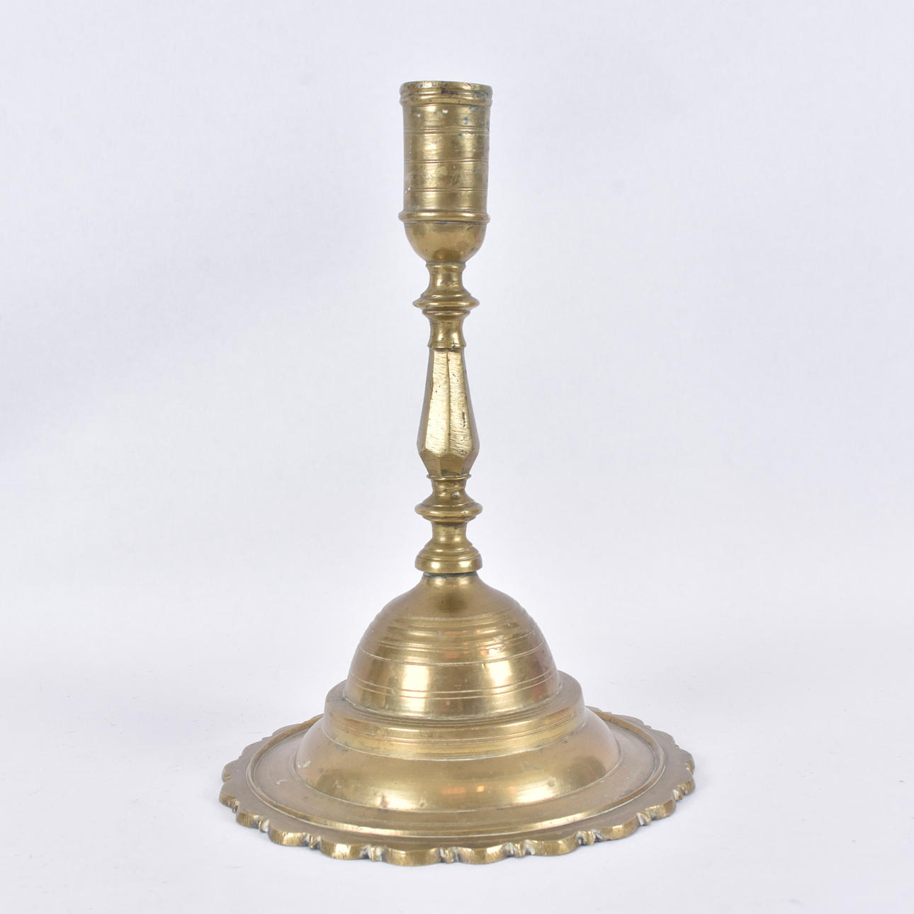 A baroque brass candlestick, 17th century.