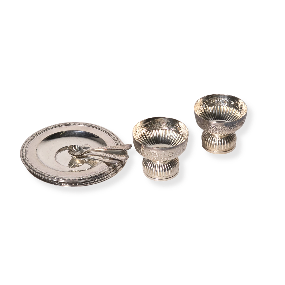 VARIOUS TABLE OBJECTS IN PUNCHED SILVER.