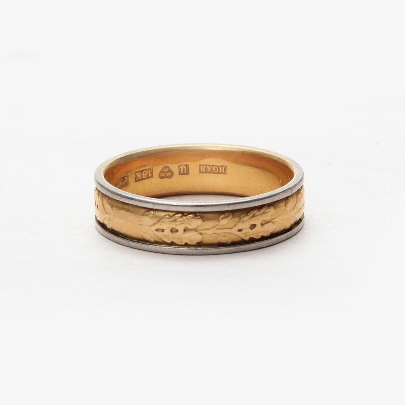 A 18K gold ring.