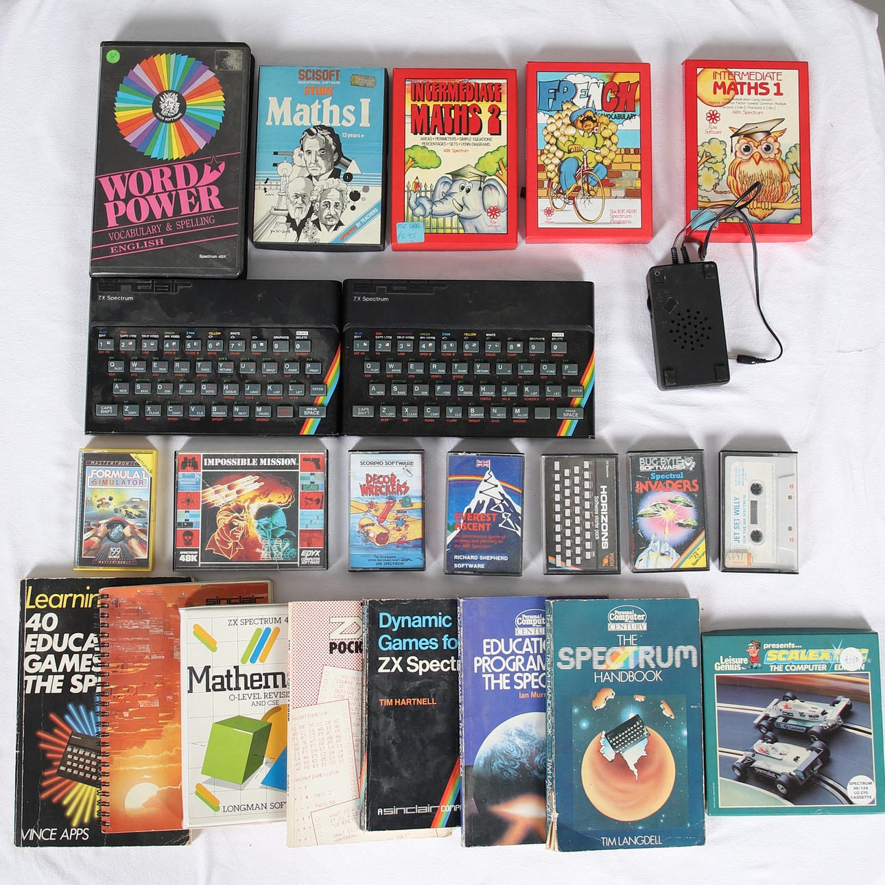 ASSORTED SINCLAIR ZX SPECTRUM ACCESSORIES AND VOLUMES.