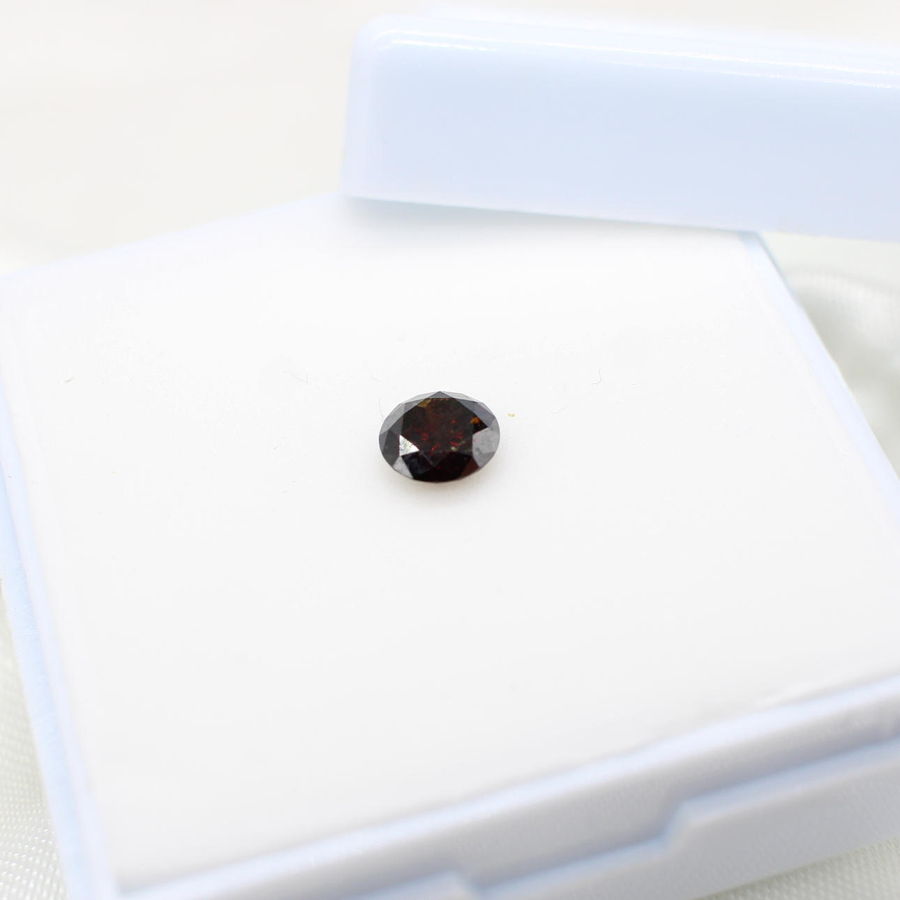 LOOSE ORANGE/BROWN DIAMOND 0.59CT.