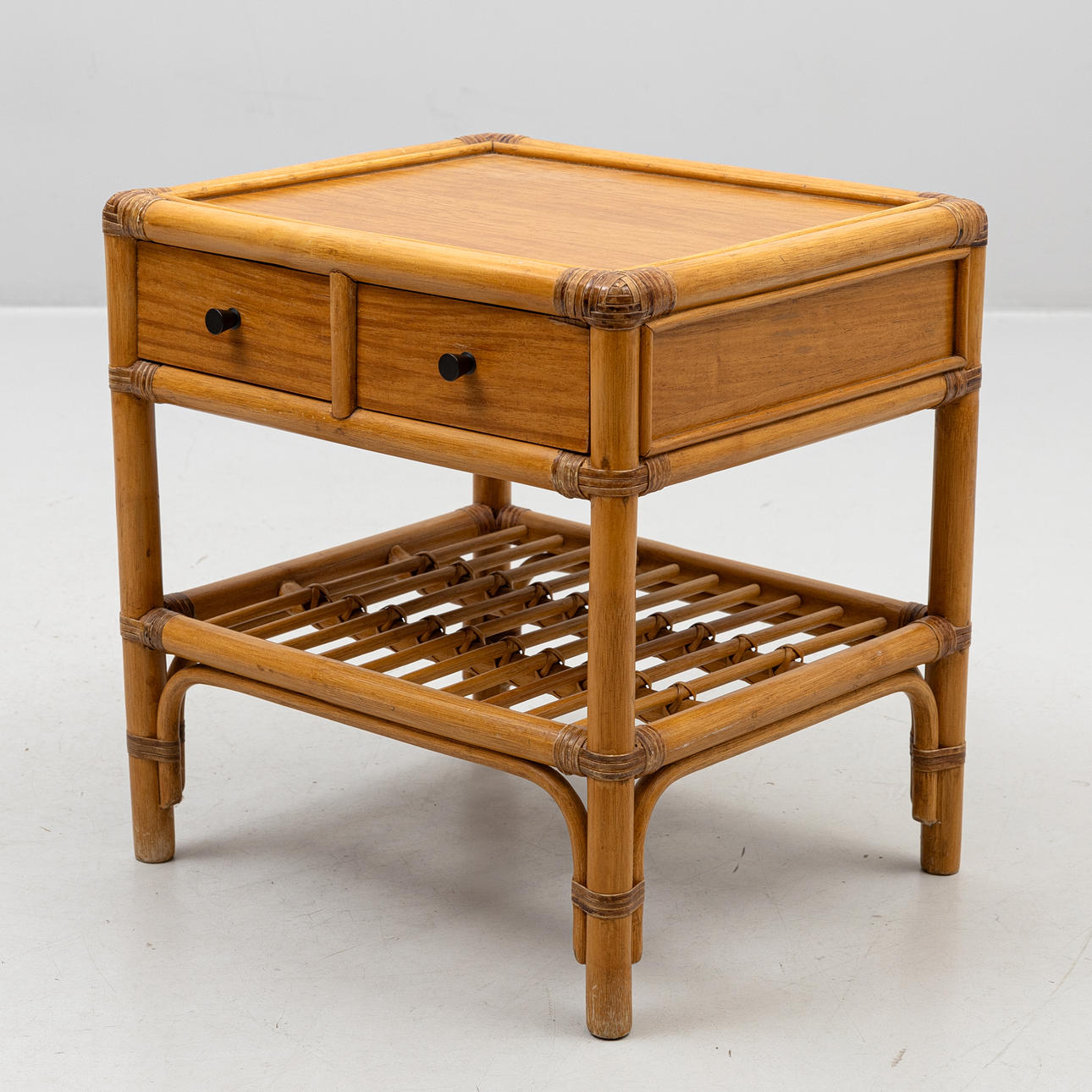 A 1970s-century Bamboo/teak bedside table.