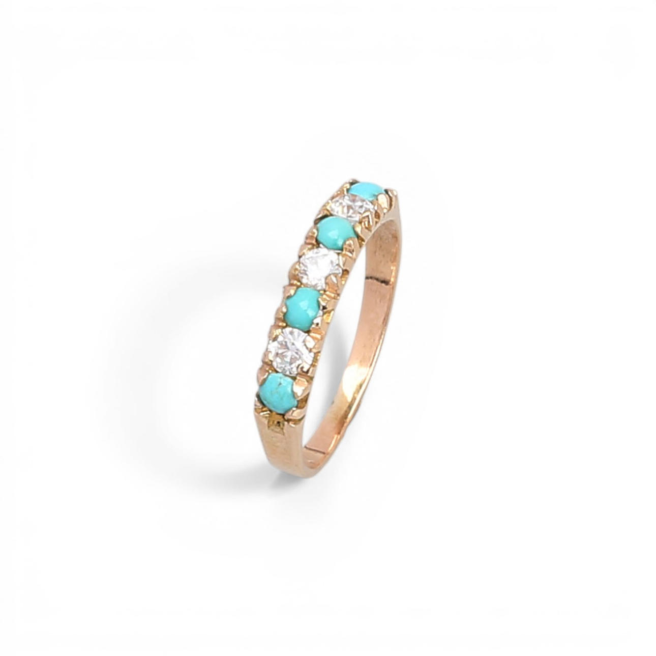 Turquoises and zircons ring.