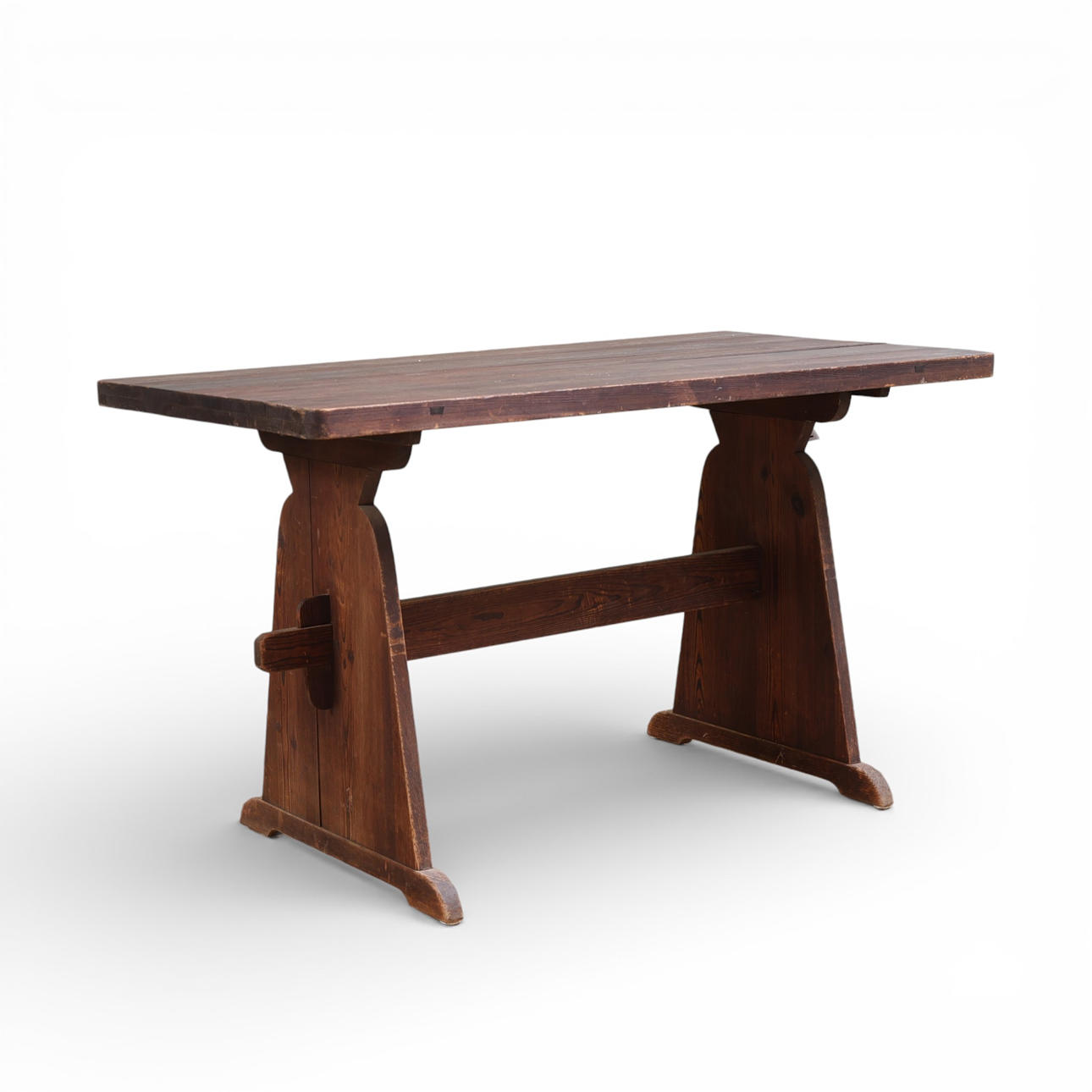 A pine dining table, early 20th century.