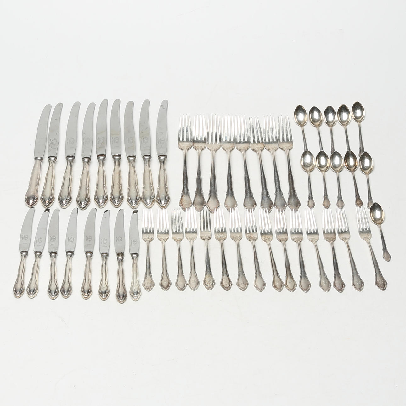 A 48-piece silver cutlery set, Chippendale.