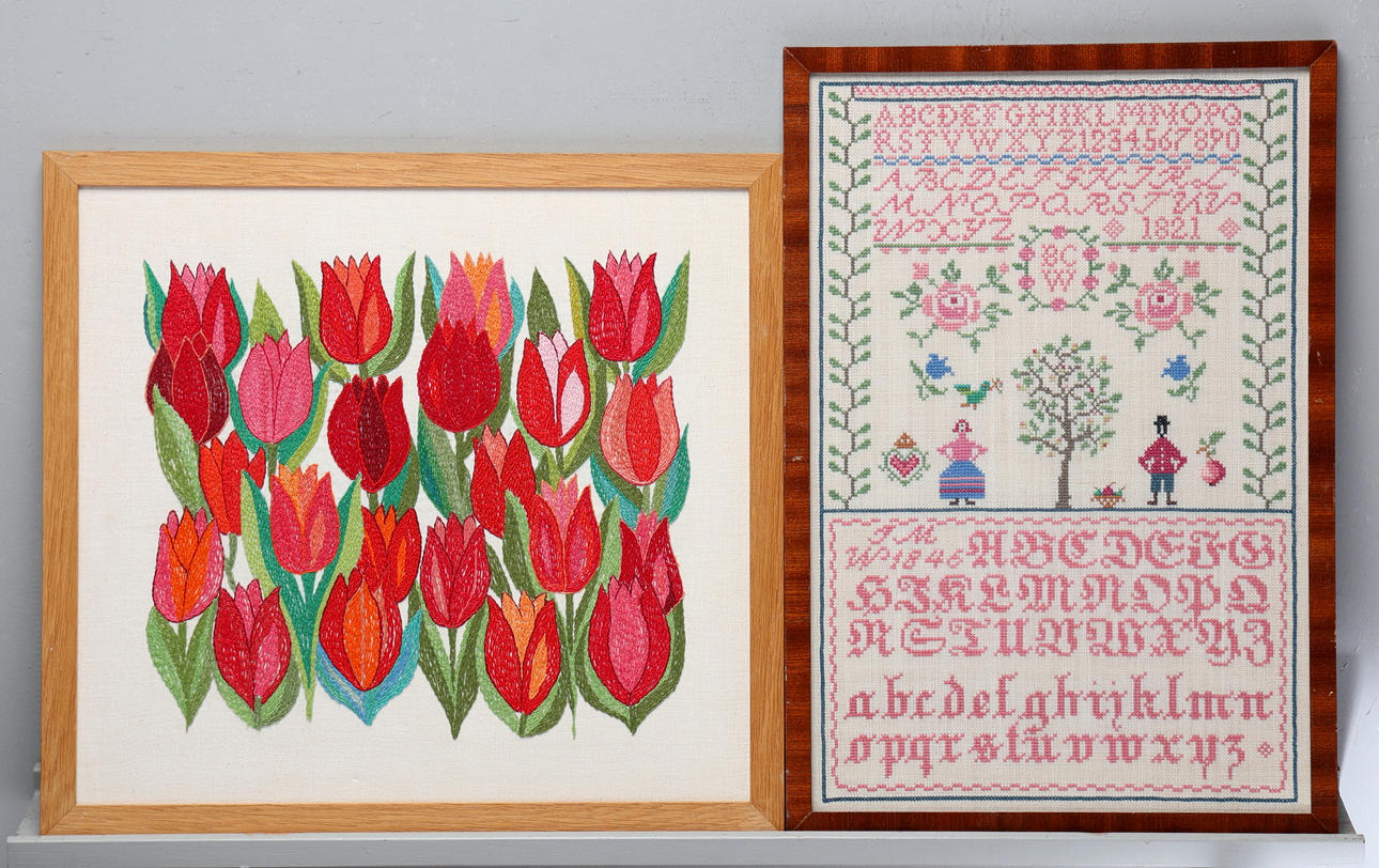 TEXTILE BOARDS, a pair, Branded cloth and tulips.