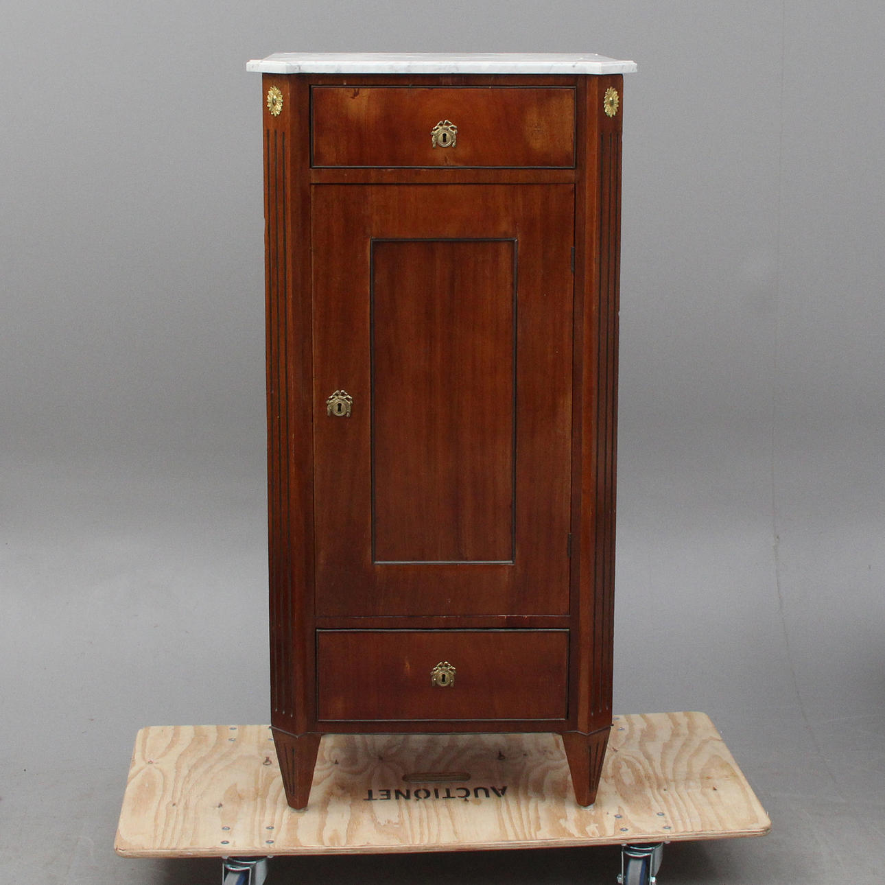 A cupboard, with stone top, late 19th century.