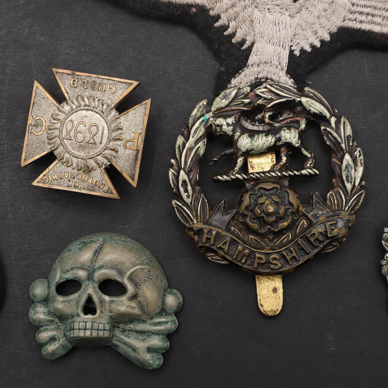 A SECOND WORLD WAR GERMAN 'NARVIK' SHIELD AND OTHER ITEMS. Weapons ...