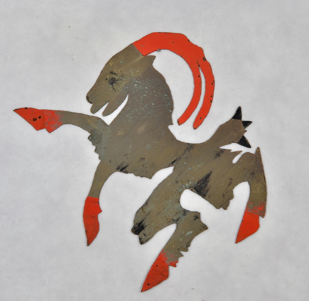 VÄGGRELIEF, metall. Hälsingebocken.