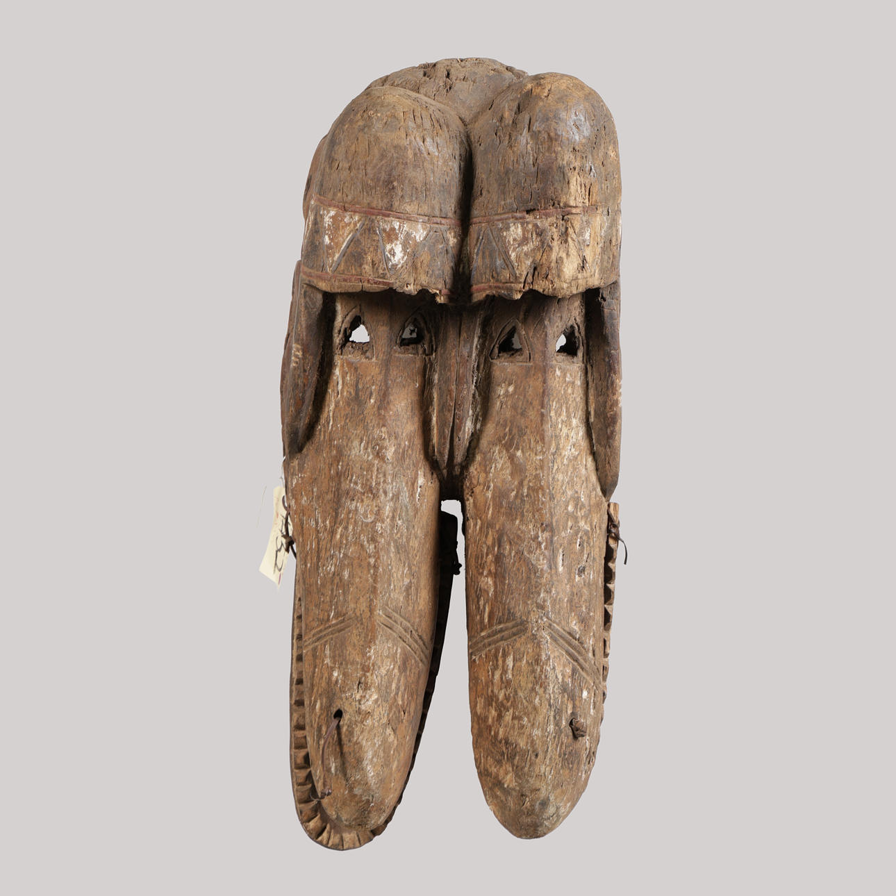 A KRAN DOUBLE HEADED MASK, LIBERIA.
