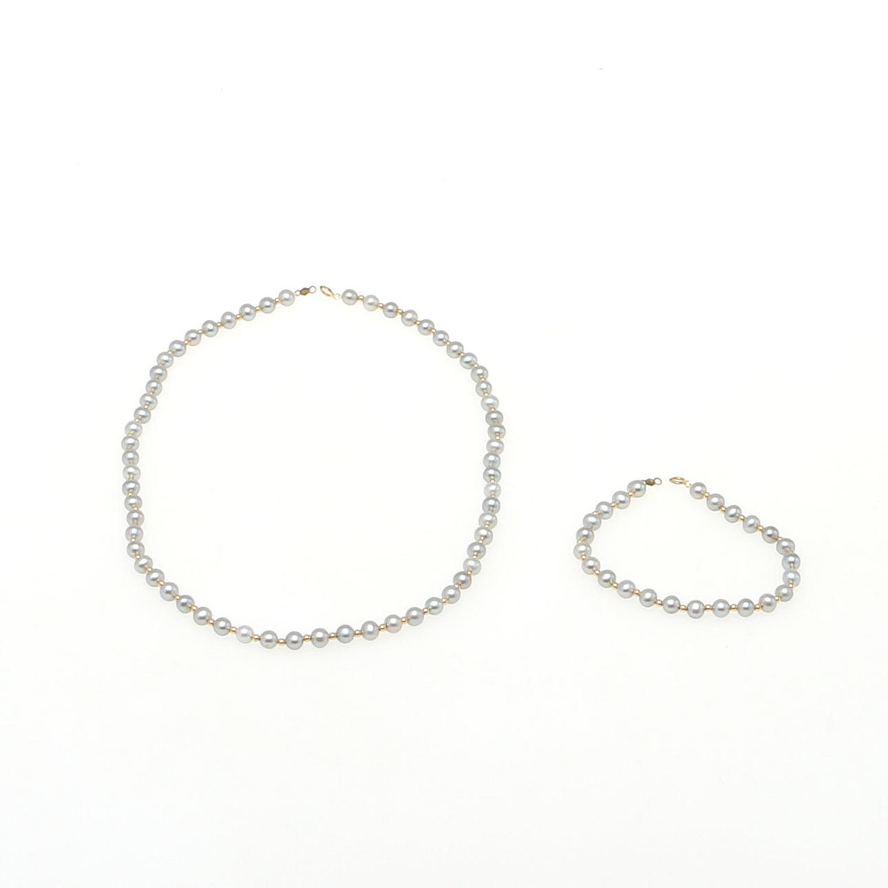 PÄRLCOLLIER samt ARMBAND med lås samt mellanpärlor i 14K rödguld.