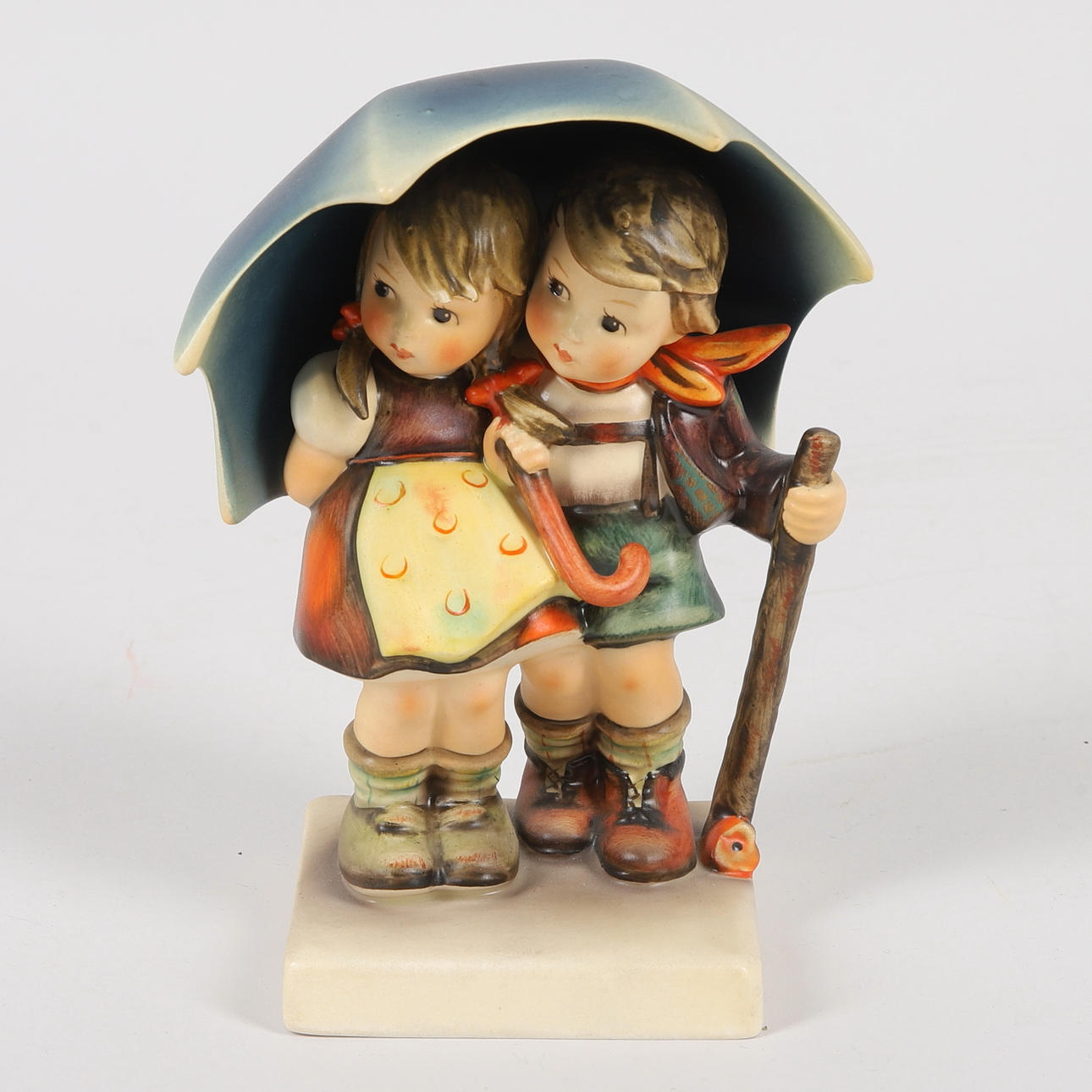 A 'Stormy Weather' porcelain figurine by M.I.Hummel, Goebel