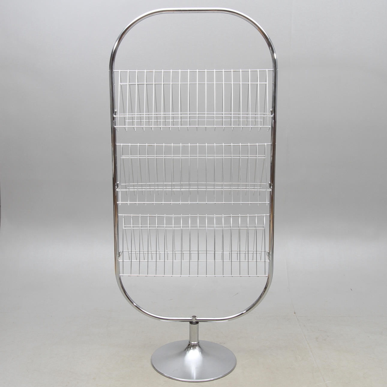 NEWSPAPER RACK, rotatable, 1900/2000s. Furniture - Other - Auctionet