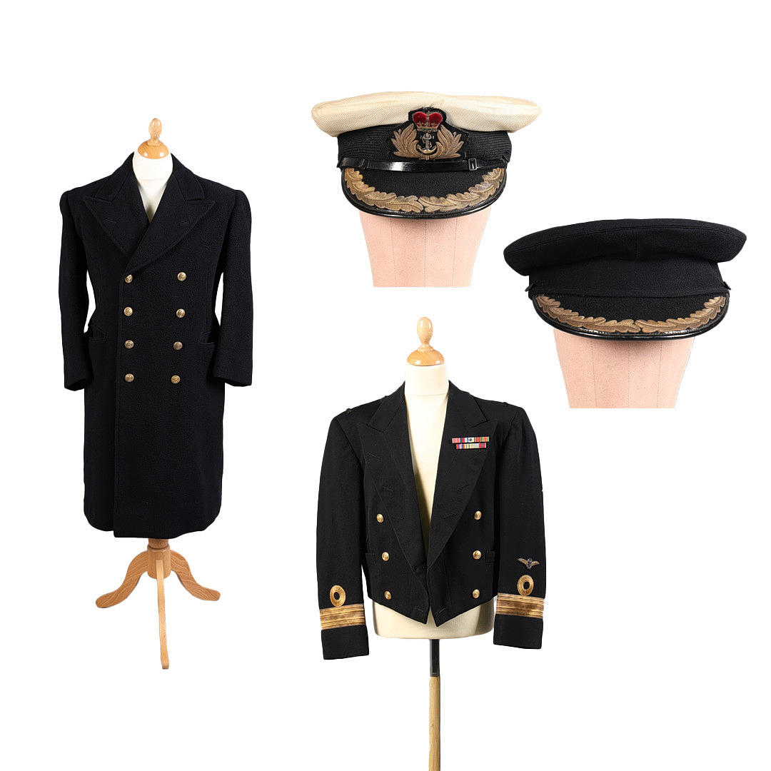 ATTRIBUTED ROYAL NAVY CAPS, MESS JACKET, AND GREATCOAT (4). Weapons ...