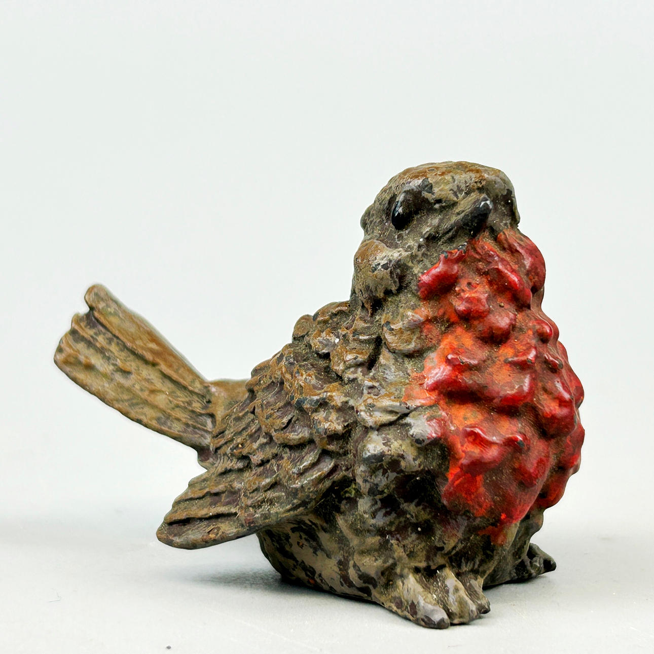 COLD PAINTED BRONZE ROBIN.