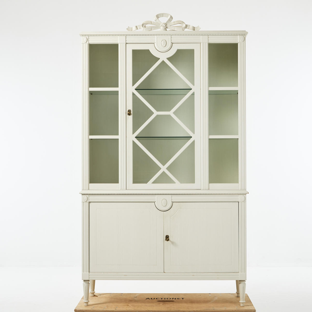 A Gustavian style white cupboard, second half of the 20th century ...