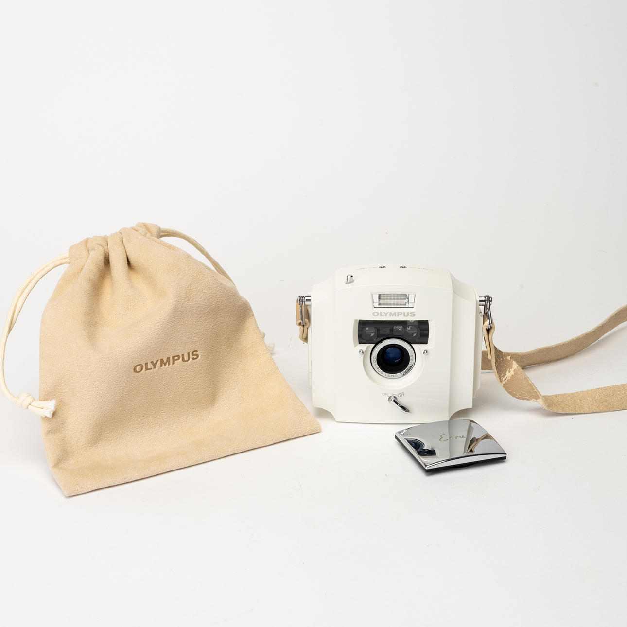 CAMERA, Olympus Ecru, numbered 14171/20000. Japan, 1991. Photo