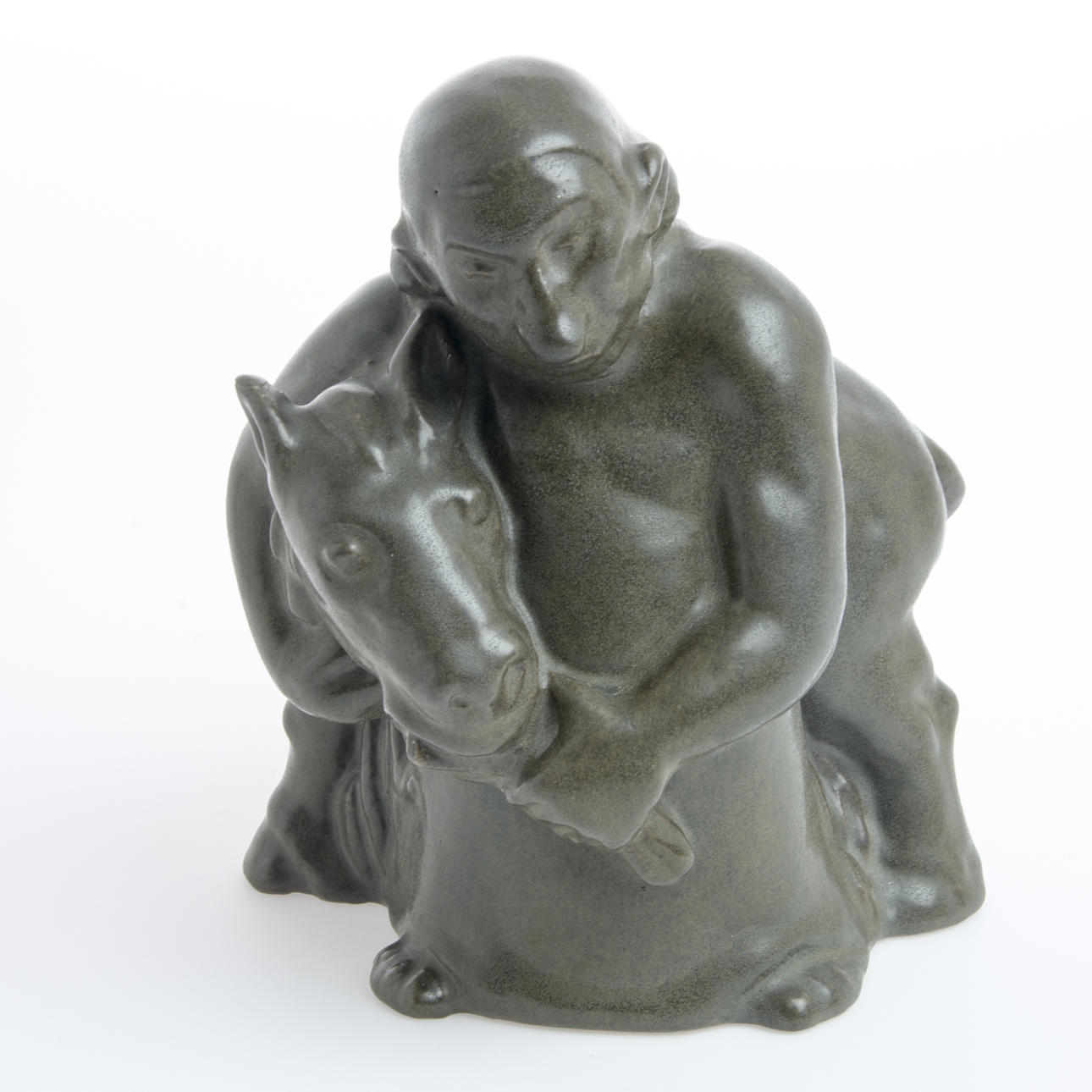 ÅKE HOLM. Skulptur, keramik, man med åsna, signerad Å. Holm.